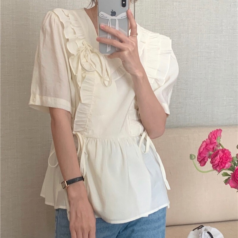Cream ruffle top